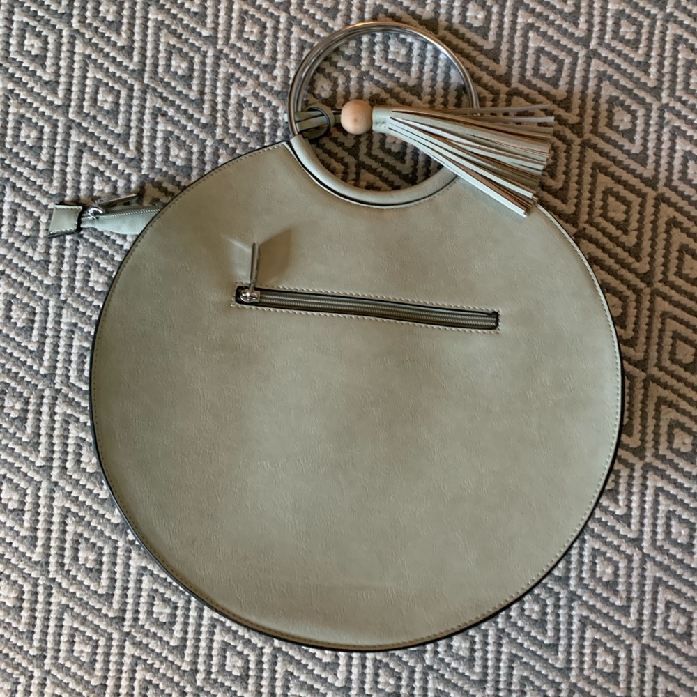 Mandoline handbag. In new condition.